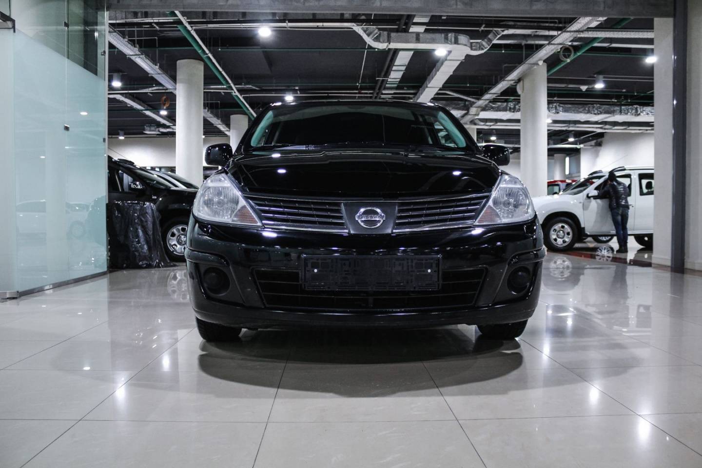 Купить Tiida с пробегом